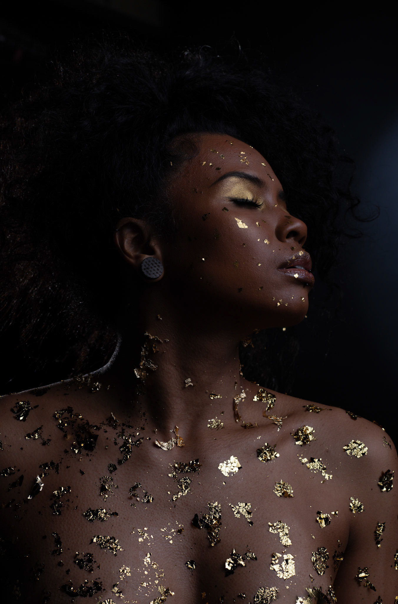 Fine-art portrait with sculptural styling and transformation theme